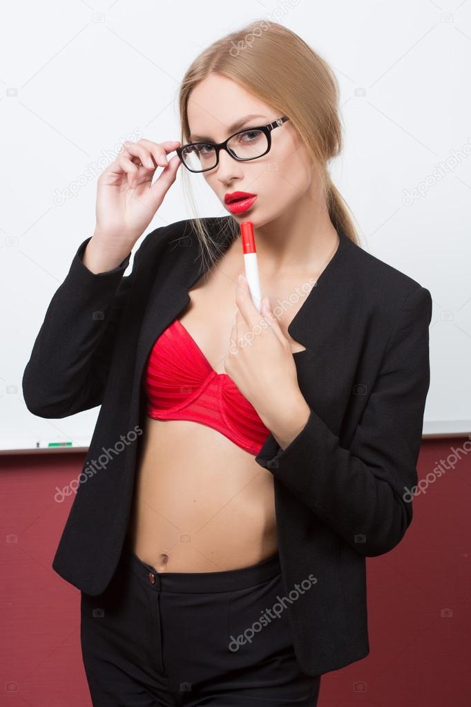 girl with glasses and a bra on a background of white board