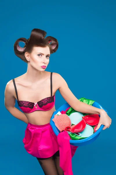 Pin-up girl with a basket with the laundry — Stock Photo, Image