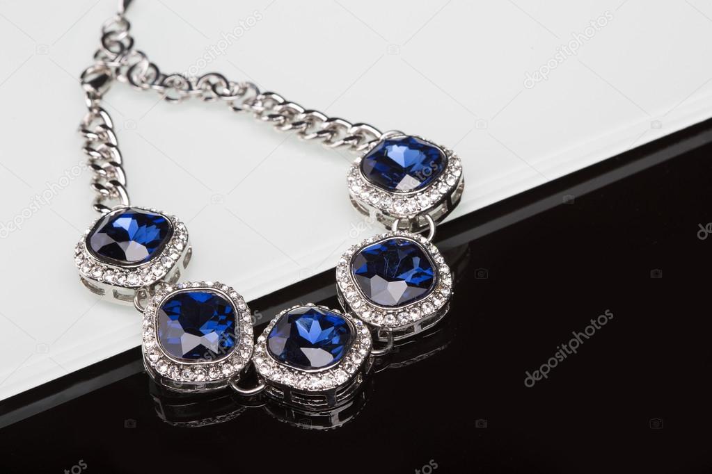Bracelet with blue stones over black 