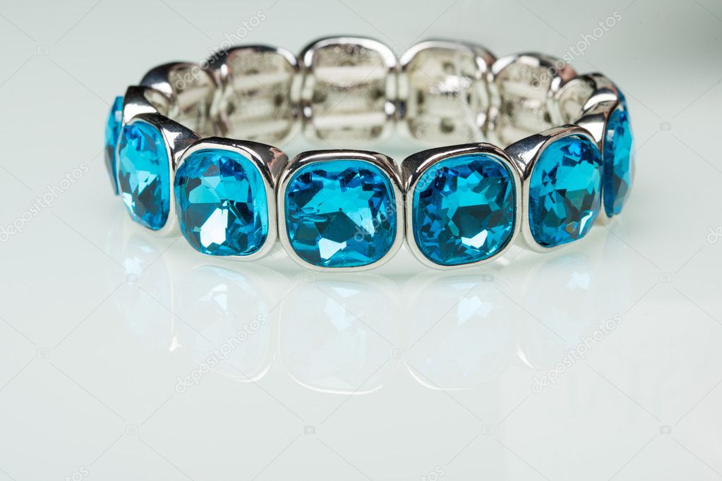 Bracelet with blue stones over white