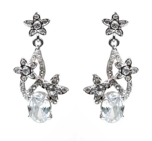 Earrings with Briliant on the white — Stock Photo, Image