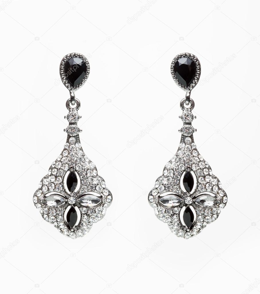 earrings with black stones on the white