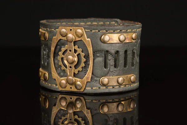 Brown leather bracelet isolated on a black — Stock Photo, Image