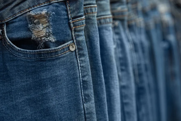 Blue jeans in a shop — Stock Photo, Image
