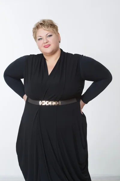 Tlustá žena v krásných šatech — Stock fotografie