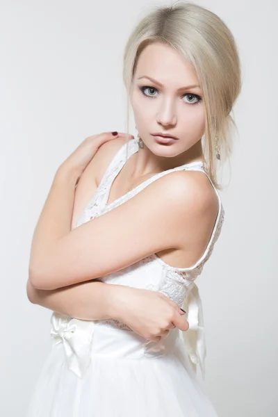 Beautiful woman in white dress — Stock Photo, Image