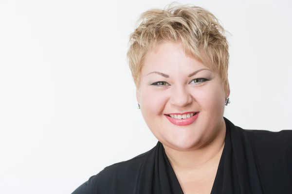 Smiling fat woman in black dress — Stock Photo, Image