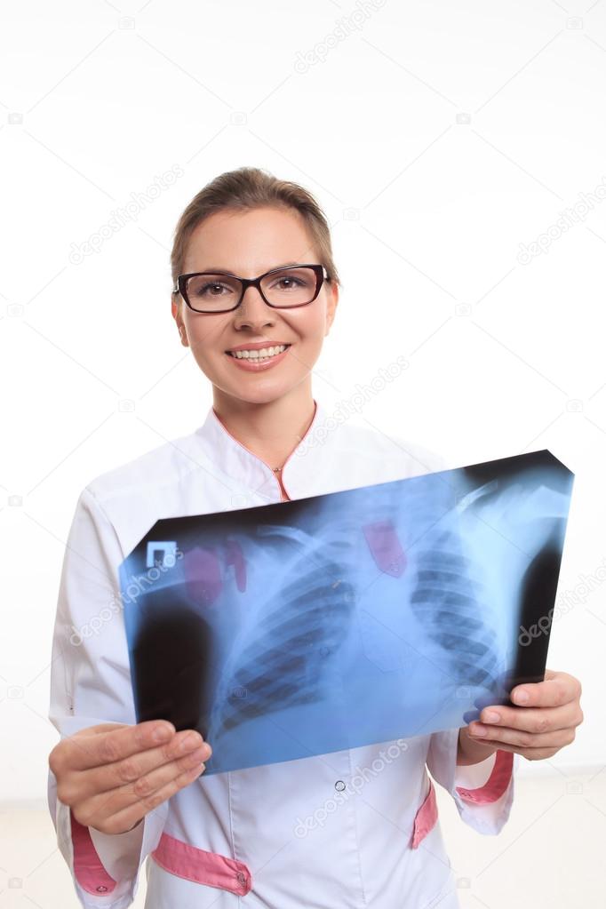 woman doctor holding an x-ray edges