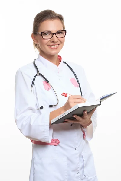 Portrait of a friendly female doctor with folder — Stock Photo, Image