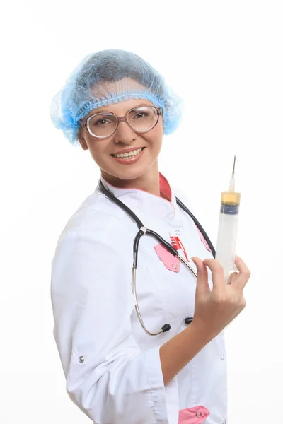 Médico mal com seringa grande — Fotografia de Stock