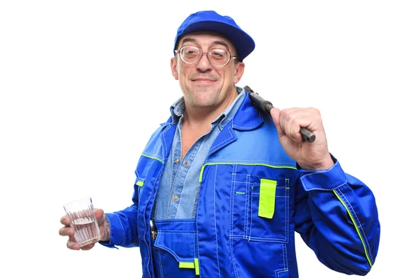 Adult drunk mechanic working with glass of alcohol. — Stock Photo, Image