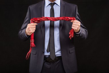 iş kıyafeti zincirleme elleri olan bir adam. kelepçe için seks oyunları