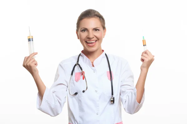 Young female doctor holding a syringe — Stock Photo, Image