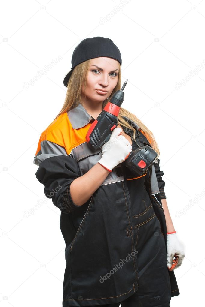 Young sexy female holding a cordless screwdriver