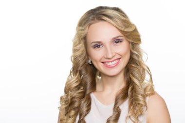Beautiful woman with long blond curly hair. clipart