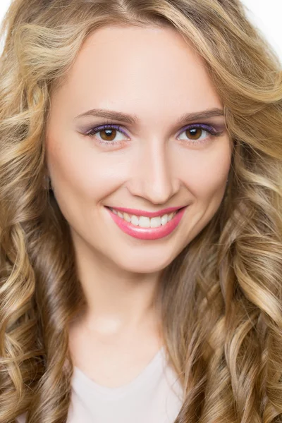 Beautiful woman with long blond curly hair. — Stock Photo, Image