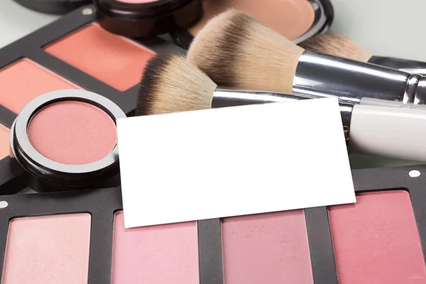 Cosmetici di trucco per gli occhi e carta bussiness — Foto Stock