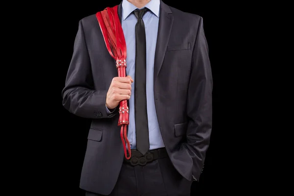 Om în costum de afaceri cu mâinile înlănțuite. cătușe pentru jocuri sexuale — Fotografie, imagine de stoc