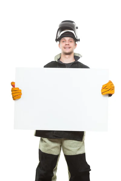 Handsome welder holding a blank form. isolated on white background — Stock Photo, Image