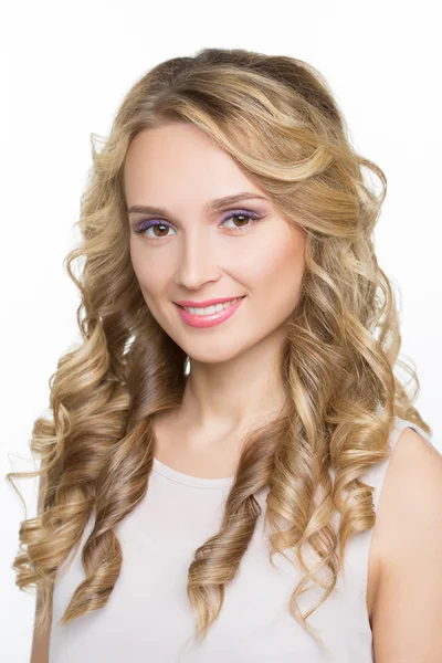 Beautiful woman with long blond curly hair. — Stock Photo, Image