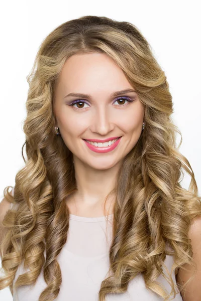 Beautiful woman with long blond curly hair. — Stock Photo, Image