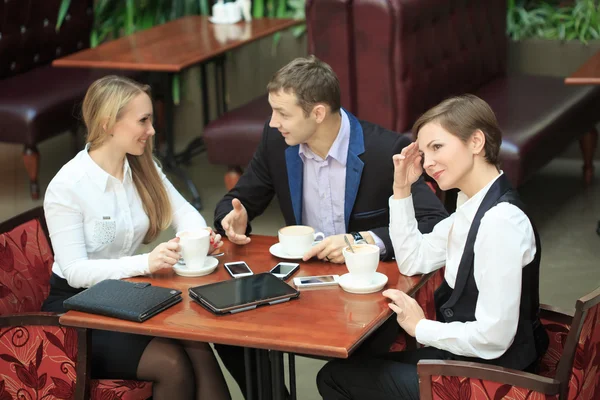 Couple of colleagues sitting in the cafe. girl jealous. flirting, love — Stock Photo, Image