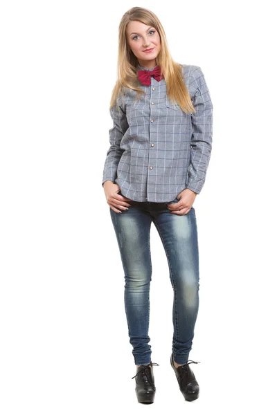 Meisje in jeans overhemd en stropdas. Geïsoleerd op witte achtergrond — Stockfoto