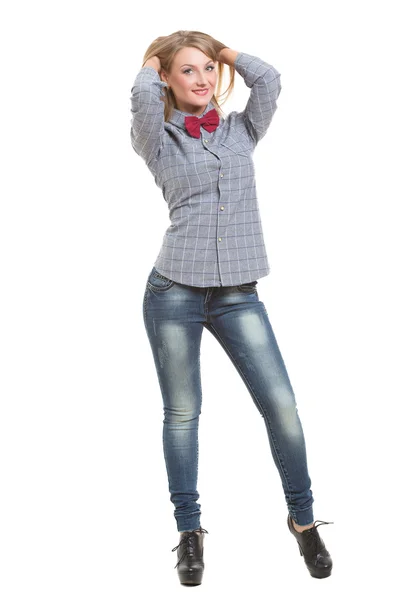 Meisje in jeans overhemd en stropdas. Geïsoleerd op witte achtergrond — Stockfoto