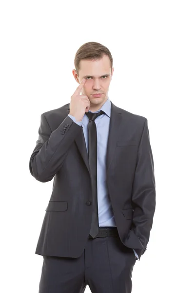 Gestos desconfiança mentiras. linguagem corporal. homem em terno de negócios isolado em fundo branco. dedo toca a pálpebra inferior. olho — Fotografia de Stock