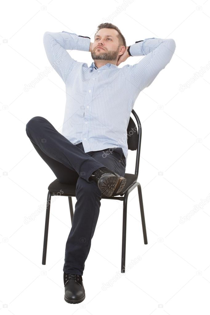 man sitting on chair. open posture, greater influence. Isolated white background.