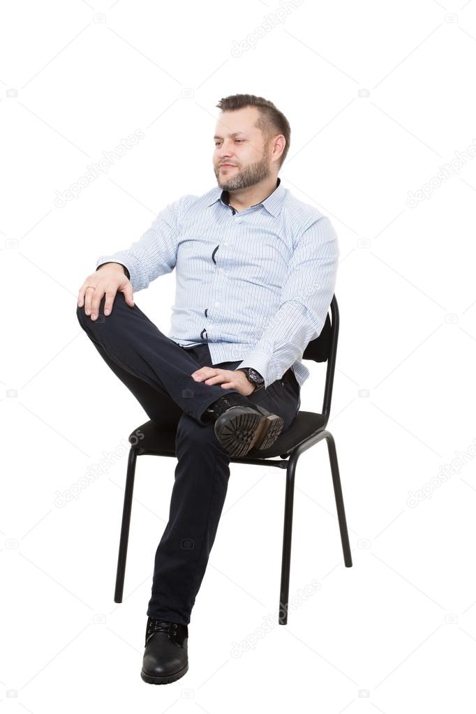 depositphotos_90740998-stock-photo-man-sitting-on-chair-open.jpg