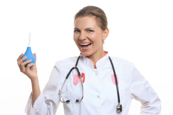 Happy female doctor holding enema — Stock Photo, Image