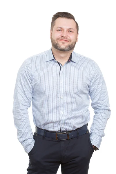 Homem adulto com barba. fundo branco isolado. mãos nos bolsos. postura de desconfiança — Fotografia de Stock