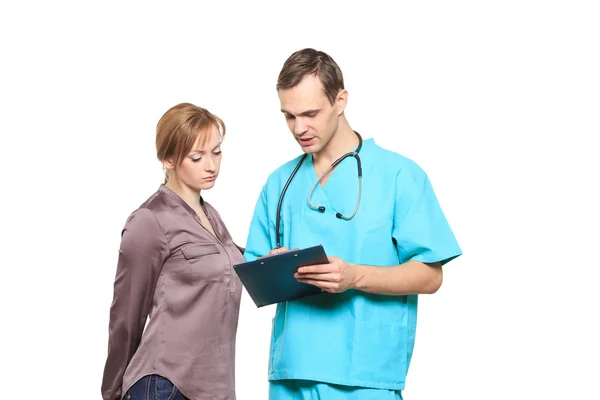 Male doctor interrogates a woman patient. Isolated white background — Stock Photo, Image