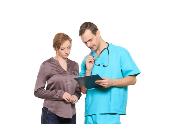 Male doctor interrogates a woman patient. Isolated white background — Stock Photo, Image