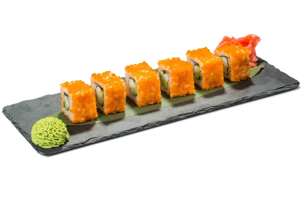 Sada sushi na černé břidlice substrátu, izolované bílé pozadí — Stock fotografie