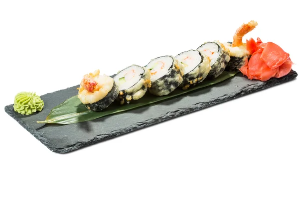 Sada sushi na černé břidlice substrátu, izolované bílé pozadí — Stock fotografie