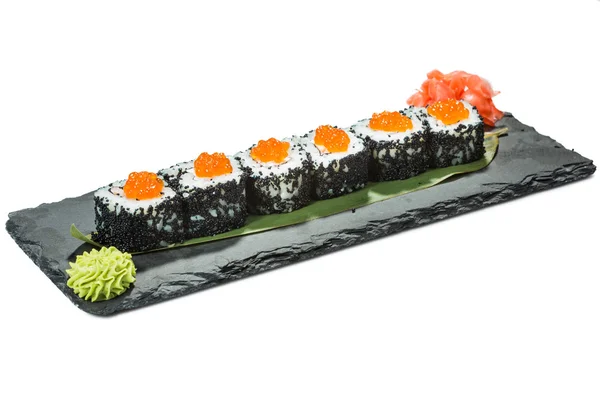 Conjunto de sushi em substrato de ardósia preta, fundo branco isolado — Fotografia de Stock