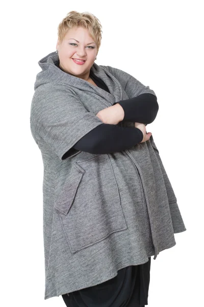 Happy fat woman. Isolated on white background. in coat — Stock fotografie