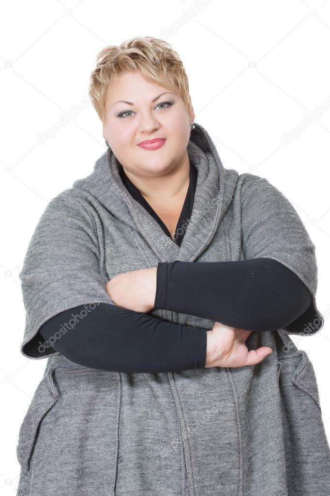 happy fat woman. Isolated on white background. in coat