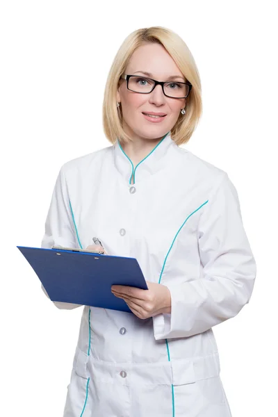 Smiling medical doctor in glasses woman with stethoscope. Isolated over white background 图库照片