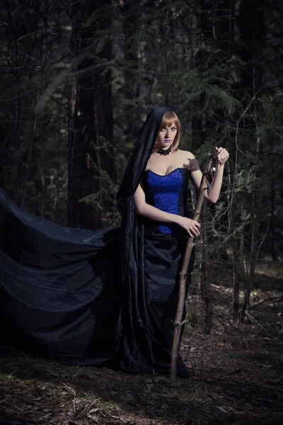 Dark portrait of the forest keeper. Fantasy and gothic. witch in woods — Stock Photo, Image