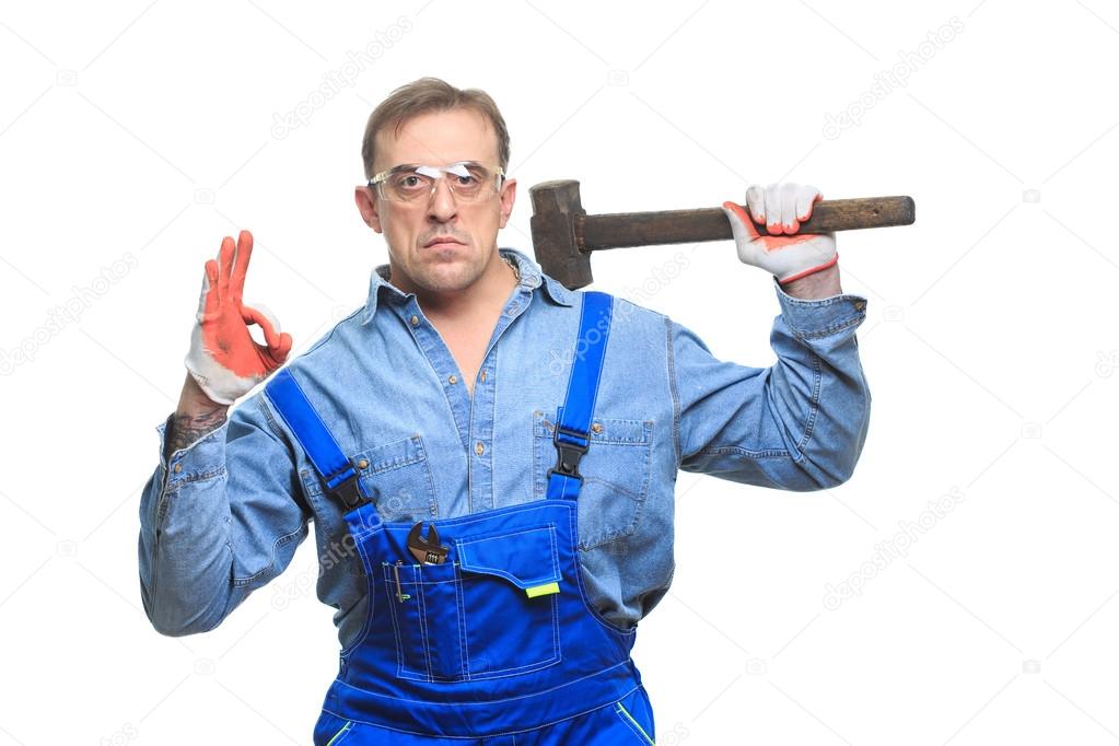 brutal Workers in protective glasses with a sledgehammer. isolated on white background