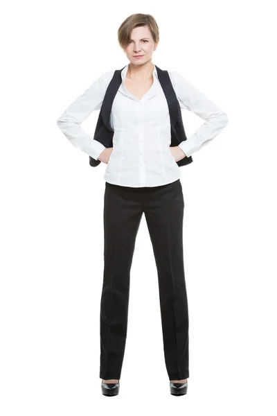 Portrait in full growth. Businesswoman legs wide apart. open posture. hand on the side.  isolated white background. fist Stock Image
