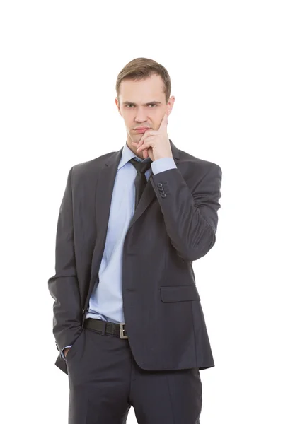 Körpersprache. Mann im Business-Anzug isoliert auf weißem Hintergrund. negative Gedanken, der Zeigefinger ist senkrecht zur Schläfe gerichtet. — Stockfoto