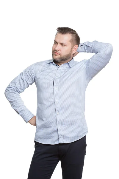 Adult male with a beard. isolated white background. fist on her hip, hand behind head. gesture of arrogance and domination. — Stockfoto