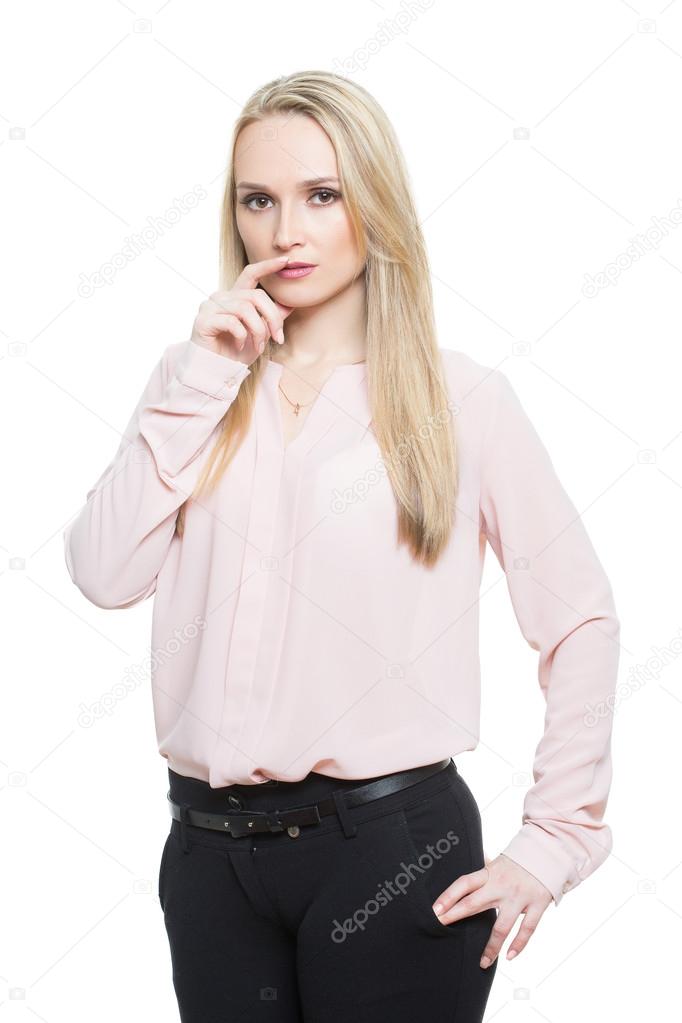 girl in pants and blous.  Isolated on white background. body language. fingers face. gesture lies. touching the hands to the face, protecting the mouth by hand