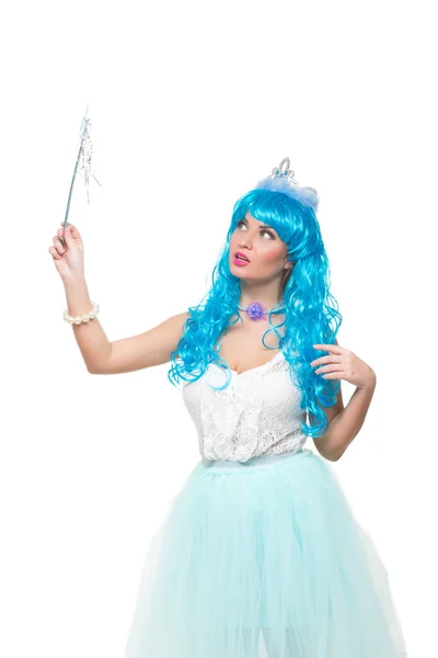 Sexy girl in a fairy costume. blue wig. Isolated on white background. waving magic wand — Stock fotografie