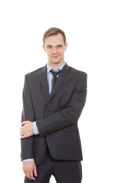 Lenguaje corporal. hombre en traje de negocios aislado fondo blanco. gestos de brazos y manos. barrera parcial formada por sus manos. Una mano en el cuerpo, la segunda cruz . — Foto de Stock