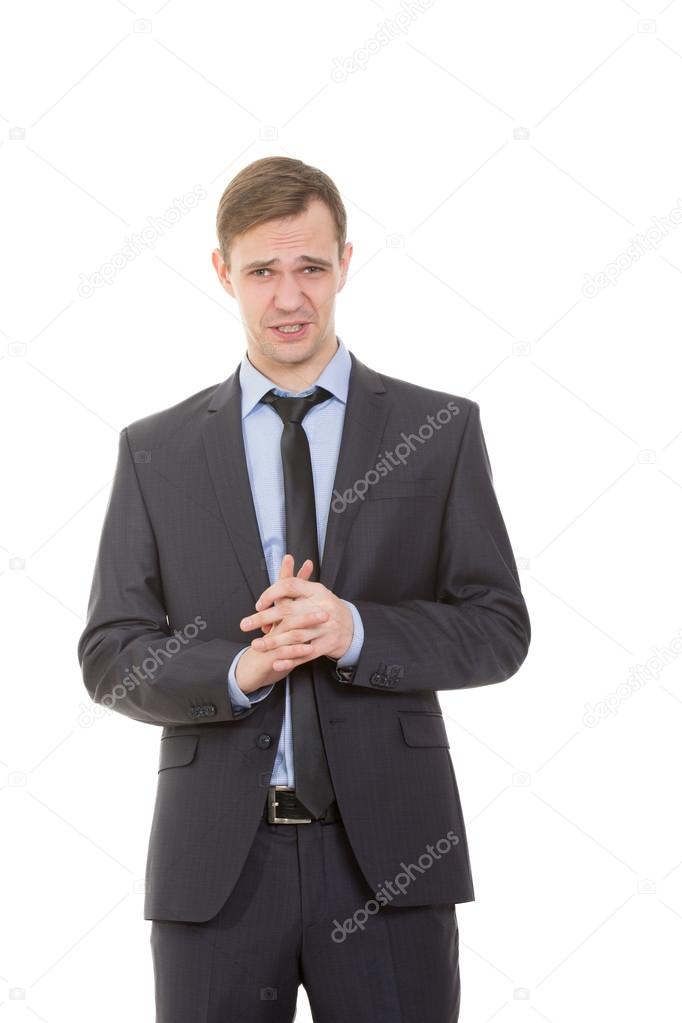 body language. man in business suit isolated white background. gestures of arms and hands. disguised gesture of crossing arms. wringing fingers